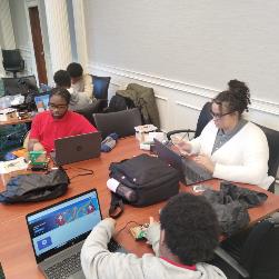 Image of Students working with Micro Bits 4