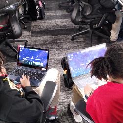 Photo of Students building a game