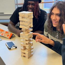 Student Group1 participate in Jenga game to learn about project management